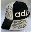 Cap signed by "L & M Jensen"